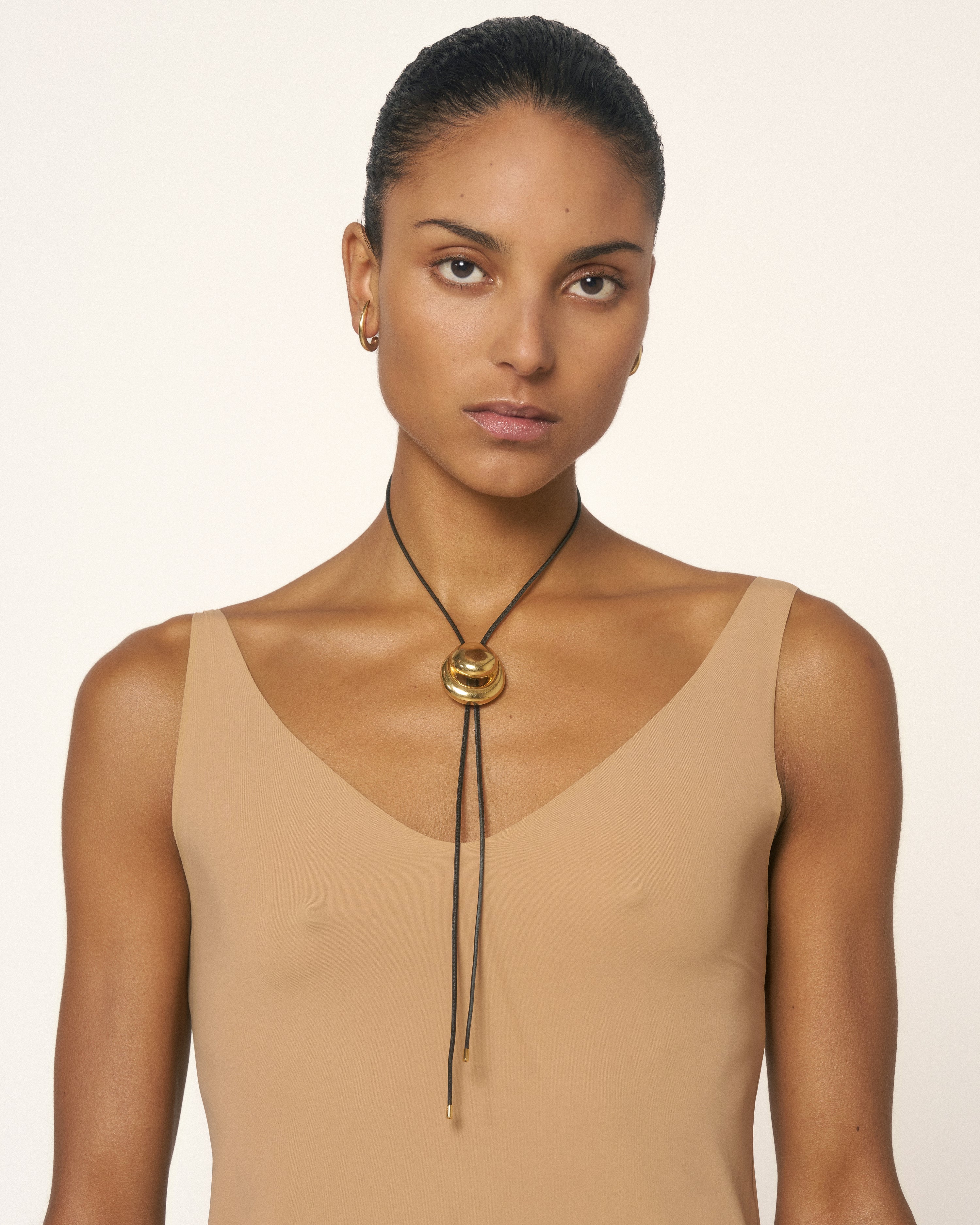 Blow Up Cord Bolo Tie